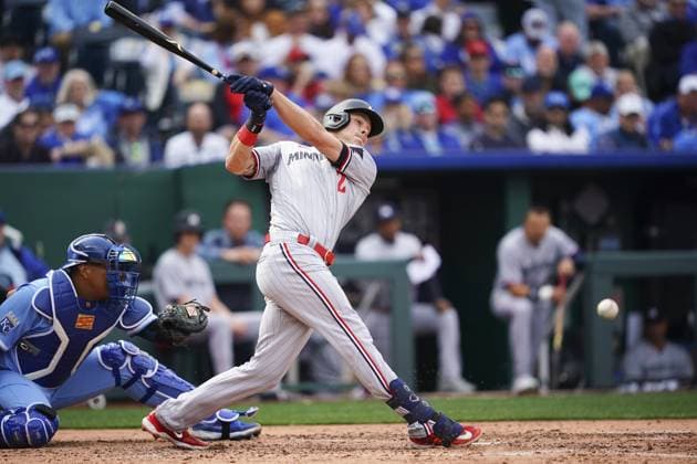 Minnesota Twins right fielder Max Kepler (26) connects on a Kansas City Royals pitch during the fourth inning on Opening Day at Kauffman Stadium in Kansas City, Missouri on Thursday, March 30, 2023.  KCP20230330112 KYLExRIVAS