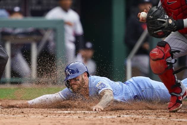 Kansas City Royals center fielder Kyle Isbel (28) is thrown out at home plate by the Minnesota Twins during the fifth inning on Opening Day at Kauffman Stadium in Kansas City, Missouri on Thursday, March 30, 2023.  KCP20230330119 KYLExRIVAS