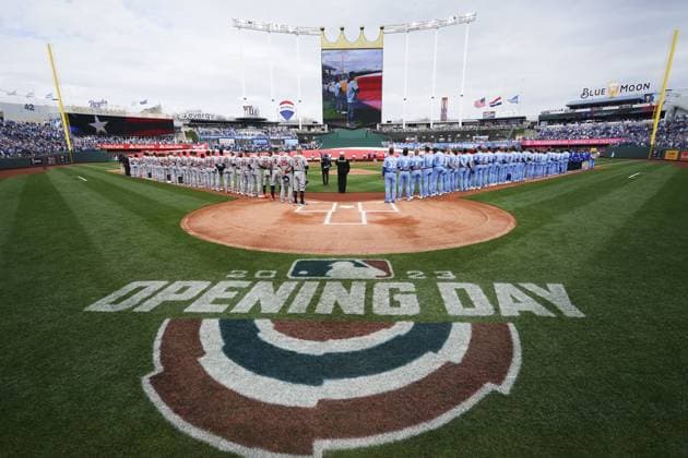 Kansas City Royals and Minnesota Twins line up for Opening Day Ceremonies at Kauffman Stadium in Kansas City, Missouri on Thursday, March 30, 2023.  KCP20230330149 KYLExRIVAS