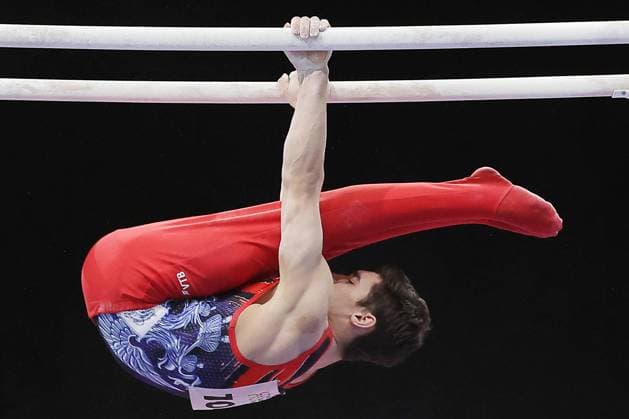 Bilder des Jahres 2023, Sport 03 MÃ¤rz Sport Themen der Woche KW13 Sport Bilder des Tages RUSSIA, YEKATERINBURG - MARCH 31, 2023: Kirill Gashkov of Russia performs parallel bars exercises during a men s artistic gymnastics qualification event at the Legends Challenge Games gymnastics tournament held at the Yekaterinburg Expo international exhibition center. Donat Sorokin TASS  58161132