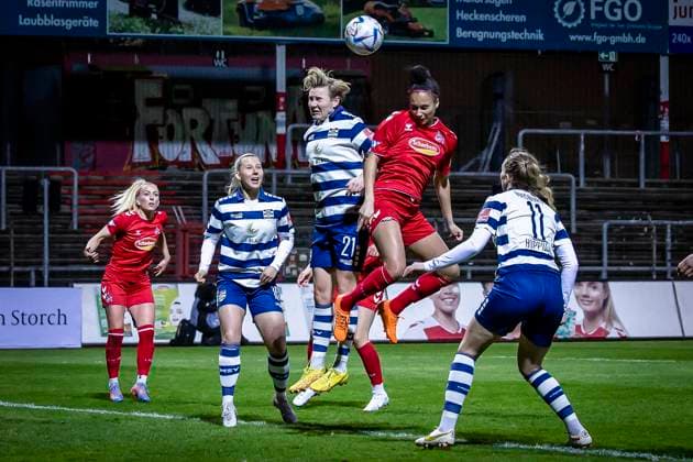 1 Women Bundesliga 1 FC Koeln MSV Duisburg, 31 03 2023 header duel between Genessee Puntigam 13, 1 FC Koeln and Sarah Freutel MSV Duisburg, 21 during the match 1 FC Koeln MSV Duisburg on matchday 17 of the Women Football Bundesliga on 31 03 2023 at the Suedstadion in Koeln DFL REGULATIONS PROHIBIT ANY USE OF PHOTOGRAPHS AS IMAGE SEQUENCES AND OR QUASI VIDEO Copyright: xBEAUTIFULxSPORTS AxelxKohringx