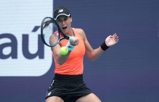Sorana Cirstea from Romania hits a forehand shot to Petra Kvitova from the Czech Republic in the women s semi-final match on the stadium court at the Miami Open in the Hard Rock Stadium in Miami Gardens, Florida, on Friday, March 31, 2023. Kvitova defeated Cirstea 7-5,6-4 to advance to the finals.  MIA20230331215 GARYxIxROTHSTEIN