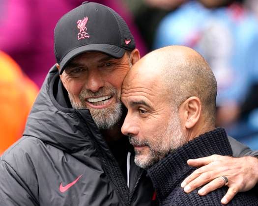 Sport Themen der Woche KW13 Sport Bilder des Tages Manchester, England, 1st April 2023. Jurgen Klopp manager of Liverpool (L) hugs Josep Guardiola manager of Manchester City before the Premier League match at the Etihad Stadium, Manchester. Picture credit should read: Andrew Yates Sportimage EDITORIAL USE ONLY. No use with unauthorised audio, video, data, fixture lists, club league logos or live services. Online in-match use limited to 120 images, no video emulation. No use in betting, games or single club league player publications. SPI-2340-0008