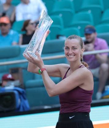 Petra Kvitova from the Czech Republic holds the championship trophy after defeating Elena Rybakina from Kazakhstan in the women s final at the Miami Open in the Hard Rock Stadium, Miami Gardens, Florida, on Saturday, April 1, 2023. Kvitova defeated Rybakina 7-6, 6-2.  MIA20230401102 GARYxIxROTHSTEIN