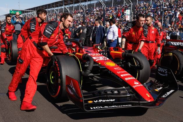 April 2, 2023, Melbourne, Australia: Carlos Sainz Jnr (ESP) sits in his (55) Ferrari SF-23 as it is moved onto the grid prior to the start of the 2023 Formula 1 Rolex Australian Grand Prix in Melbourne, Australia. Melbourne Australia - ZUMAl303 20230402_zaf_l303_006 Copyright: xSydneyxLowx