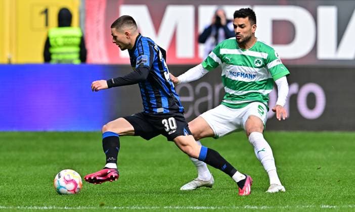02 04 2023 Football season 2022 2023 2 Football Bundesliga 26 Matchday SC Paderborn 07 SCP SpVgg Greuther Fürth Kleeblatt Sportfoto Zink DFL regulations prohibit any use of photographs as image sequences and or quasi video only for editorial use Florent Muslija 30, SC Paderborn 07 Oussama Haddadi 5, SpVgg Greuther Fürth , right