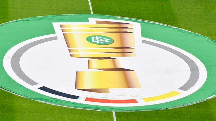 Soccer DFB Pokal 2022 2023, quarterfinal RB Leipzig vs Borussia Dortmund 05 04 2023 center circle with large DFB Pokal logo at the match RB Leipzig vs Dortmund 05 04 2023 Leipzig Saxony Germany Red Bull Arena