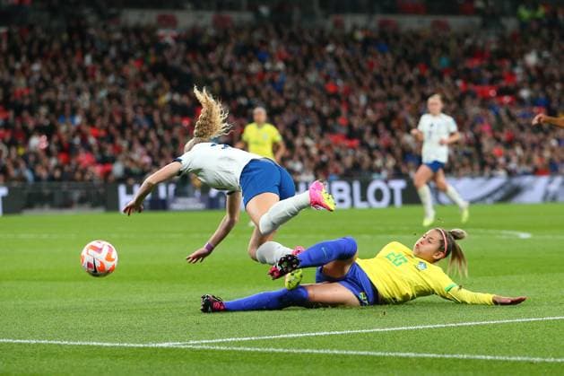 6th April 2023; Wembley Stadium, London, England; Womens Finalissima Football, England versus Brazil; Fernanda of Brazil wins a slide tackle against Katie Robinson of England  ActionPlus12494711 KatiexChan