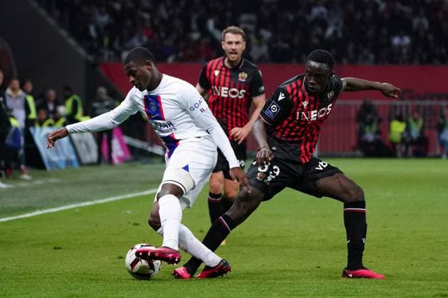 Nuno Mendes (Paris SG) - Antoine Alpha Mendy (OGC Nice) FOOTBALL : OGC Nice vs Paris SG - Ligue 1 Uber Eats - Nice - 08 04 2023 NorbertScanella Panoramic 