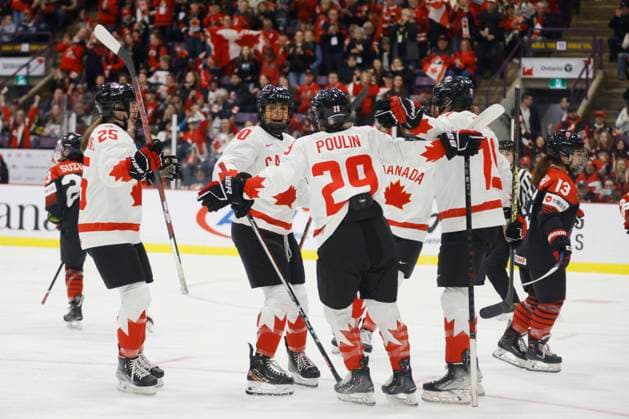 April 8, 2023, BRAMPTON, ON, CANADA: Canada forward Sarah Nurse (20) celebrates a goal with defender Jaime Bourbonnais (25), forward Marie-Philip Poulin (29) and forward Brianne Jenner (19) during first period IIHF WomenöÄÃ s World Hockey Championship hockey action against Japan in Brampton, Ont., on Saturday, April 8, 2023. Canada News - April 8, 2023  - ZUMAc35_ 20230408_zaf_c35_032 Copyright: xColexBurstonx