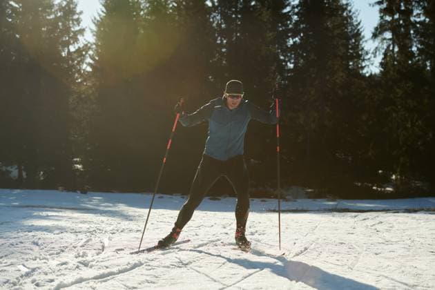 Nordic skiing or Cross-country skiing classic technique practiced by man in a beautiful panoramic trail at morning.Selective focus. Nordic skiing or Cross-country skiing classic technique practiced by man in a beautiful panoramic trail at morning. Selective focus (License=RF) 19811422 ,model released, Symbolfoto Copyright: xZoonar.com BENISxARAPOVICx 19811422 ,model released, Symbolfoto ,property released
