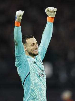 ROTTERDAM - Feyenoord goalkeeper Justin Bijlow during the UEFA Europa League quarterfinal match between Feyenoord and AS Roma at Feyenoord Stadion de Kuip on April 13, 2023 in Rotterdam, Netherlands. ANP MAURICE VAN STONE UEFA Europa League Quarter-finals, 1st leg 2022 2023 xVIxANPxSportx xxANPxIVx 466939561 originalFilename: 466939561.jpg