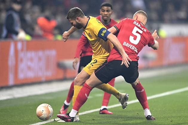 LEVERKUSEN, GERMANY - APRIL 13 : Nieuwkoop Bart defender of Union St-Gilloise battles for the ball with Bakker Mitchel defender of Bayer Leverkusen during the UEFA Europa League Quarter-finals, 1st leg match between Leverkusen and Union SG at the BayArena on April 13, 2023 in Leverkusen, Germany, 13 04 2023 ( Leverkusen v Union SG - UEFA Europa League PhotoNews Panoramic 