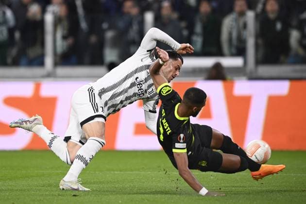 Foto Fabio Ferrari LaPresse 13 Aprile 2023 - Torino, Italia - calcio - Juventus vs Sporting Lisbona - UEFA Europa League - quarti di finale -1 2 - Juventus Stadium. Nella foto: Filip Kostic (Juventus F.C.), Jerry St. Juste (Sporting Lisbona) April 13, 2023 Turin, Italy - sport, calcio - Juventus vs Sporting Lisbona - UEFA Europa League - quarter to finals-1 2- Juventus Stadium. In the pic: Filip Kostic (Juventus F.C.), Jerry St. Juste (Sporting Lisbona)  Copyright: xFabioxFerrari LaPressex