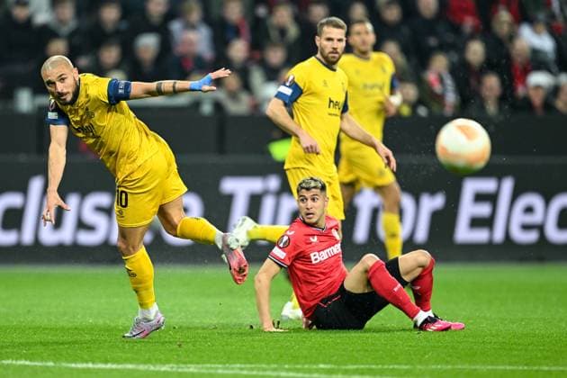 GER, Europa League, Bayer Leverkusen Union Saint Giloise 13 04 2023, BayArena , Leverkusen , GER, Europa League, Bayer Leverkusen Union Saint Giloise in picture picture shows Teddy Teuma Union Saint Gilloise 10 l clears the ball and Exequiel Palacois Bayer Leverkusen 25 sits on the ground nordphotoxGmbHx xTeresaxKroeger nordphoto00008