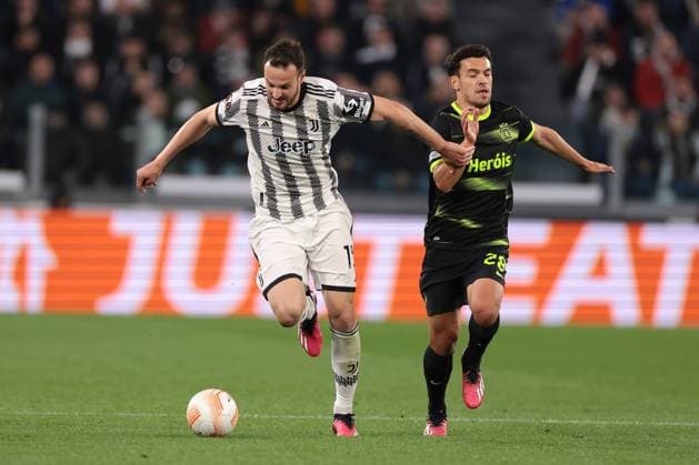 Turin, Italy, 13th April 2023. Federico Gatti of Juventus battles for possession with Pedro Goncalves of Sporting CP during the UEFA Europa League match at Allianz Stadium, Turin. Picture credit should read: Jonathan Moscrop Sportimage EDITORIAL USE ONLY. No use with unauthorised audio, video, data, fixture lists, club league logos or live services. Online in-match use limited to 120 images, no video emulation. No use in betting, games or single club league player publications. SPI-2362-0003