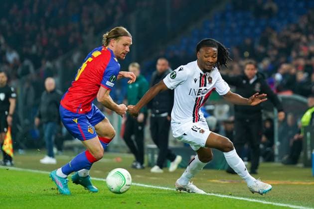 13 04 2023, Basel, St Jakobs Park, Switzerland, UEFA Europa Conference League FC Basel OGC Nice, 5 Michael Lang Basel and 19 Khephren Thuram Nice battle for the ball duel Basel St Jakobs Park Basel Switzerland  Copyright: xJustPictures.ch DanielaxPorcellix