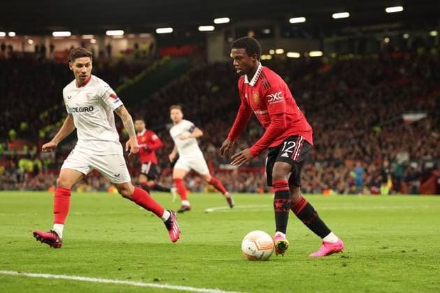 Mandatory Credit: Photo by Ryan Browne Shutterstock (13867464bn) Tyrell Malacia of Manchester United, ManU Manchester United v Sevilla, UEFA Europa League, Quarter-Final, First Leg, Football, Old Trafford, Manchester, UK - 13 Apr 2023 Manchester United v Sevilla, UEFA Europa League, Quarter-Final, First Leg, Football, Old Trafford, Manchester, UK - 13 Apr 2023 Copyright: xRyanxBrowne Shutterstockx 13867464bn