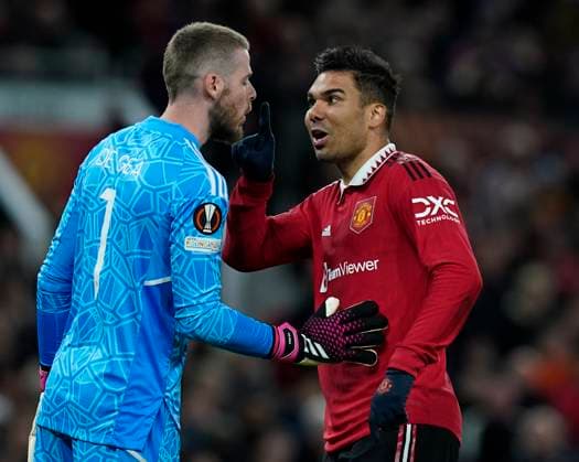 Manchester, England, 13th April 2023. David De Gea of Manchester United, ManU and Casemiro of Manchester United exchange views during the UEFA Europa League match at Old Trafford, Manchester. Picture credit should read: Andrew Yates Sportimage EDITORIAL USE ONLY. No use with unauthorised audio, video, data, fixture lists, club league logos or live services. Online in-match use limited to 120 images, no video emulation. No use in betting, games or single club league player publications. SPI-2367-0048