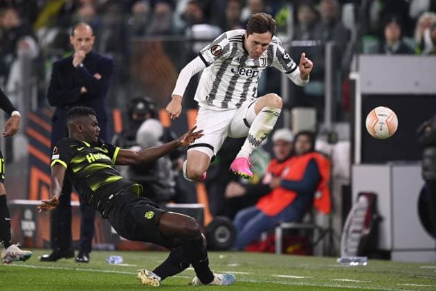 Foto Fabio Ferrari LaPresse 13 Aprile 2023 - Torino, Italia - calcio - Juventus vs Sporting Lisbona - UEFA Europa League - quarti di finale -1 2 - Juventus Stadium. Nella foto: Federico Chiesa (Juventus F.C.), Ousmane Diomande(Sporting Lisbona) April 13, 2023 Turin, Italy - sport, calcio - Juventus vs Sporting Lisbona - UEFA Europa League - quarter to finals-1 2- Juventus Stadium. In the pic: Federico Chiesa (Juventus F.C.), Ousmane Diomande(Sporting Lisbona)  Copyright: xFabioxFerrari LaPressex