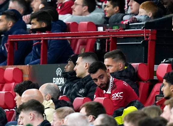 Manchester, England, 13th April 2023. Bruno Fernandes of Manchester United, ManU takes a seat on the bench following his substitution during the UEFA Europa League match at Old Trafford, Manchester. Picture credit should read: Andrew Yates Sportimage EDITORIAL USE ONLY. No use with unauthorised audio, video, data, fixture lists, club league logos or live services. Online in-match use limited to 120 images, no video emulation. No use in betting, games or single club league player publications. SPI-2367-0062