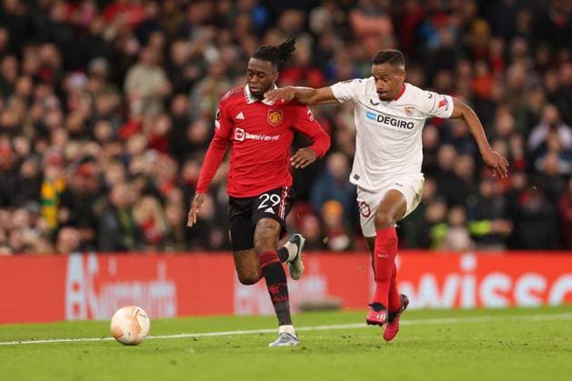 Mandatory Credit: Photo by Ryan Browne Shutterstock (13867464ck) Aaron Wan-Bissaka of Manchester United, ManU and Fernando of Sevilla. Manchester United v Sevilla, UEFA Europa League, Quarter-Final, First Leg, Football, Old Trafford, Manchester, UK - 13 Apr 2023 Manchester United v Sevilla, UEFA Europa League, Quarter-Final, First Leg, Football, Old Trafford, Manchester, UK - 13 Apr 2023 Copyright: xRyanxBrowne Shutterstockx 13867464ck