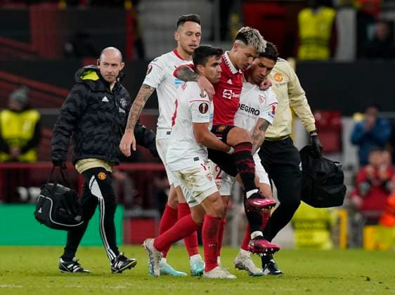 Manchester, England, 13th April 2023. Lisandro Martinez of Manchester United, ManU is carried off with what looks like a bad injury during the UEFA Europa League match at Old Trafford, Manchester. Picture credit should read: Andrew Yates Sportimage EDITORIAL USE ONLY. No use with unauthorised audio, video, data, fixture lists, club league logos or live services. Online in-match use limited to 120 images, no video emulation. No use in betting, games or single club league player publications. SPI-2367-0068