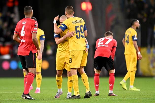 LEVERKUSEN, GERMANY - APRIL 13 : Teuma Teddy midfielder of Union St-Gilloise and Kandouss Ismael defender of Union St-Gilloise after the UEFA Europa League Quarter-finals, 1st leg match between Leverkusen and Union SG at the BayArena on April 13, 2023 in Leverkusen, Germany, 13 04 2023 ( Leverkusen v Union SG - UEFA Europa League PhotoNews Panoramic 