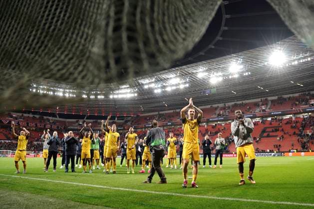LEVERKUSEN, GERMANY - APRIL 13 : Van Der Heyden Siebe defender of Union St-Gilloise and Boniface Victor forward of Union St-Gilloise greeting the fans despite the tie during the UEFA Europa League Quarter-finals, 1st leg match between Leverkusen and Union SG at the BayArena on April 13, 2023 in Leverkusen, Germany, 13 04 2023 ( Leverkusen v Union SG - UEFA Europa League PhotoNews Panoramic 