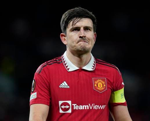 Manchester, England, 13th April 2023. Harry Maguire of Manchester United, ManU leaves the game dejected after surrendering a two goal lead during the UEFA Europa League match at Old Trafford, Manchester. Picture credit should read: Andrew Yates Sportimage EDITORIAL USE ONLY. No use with unauthorised audio, video, data, fixture lists, club league logos or live services. Online in-match use limited to 120 images, no video emulation. No use in betting, games or single club league player publications. SPI-2367-0080