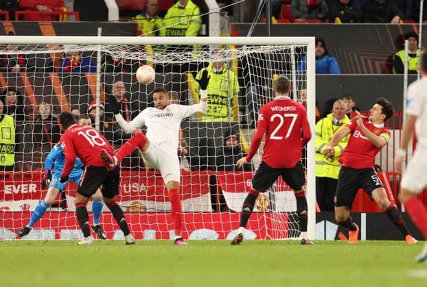 Mandatory Credit: Photo by Ryan Browne Shutterstock (13867464ec) Harry Maguire of Manchester United, ManU scores an own goal to make it 2-2. Manchester United v Sevilla, UEFA Europa League, Quarter-Final, First Leg, Football, Old Trafford, Manchester, UK - 13 Apr 2023 Manchester United v Sevilla, UEFA Europa League, Quarter-Final, First Leg, Football, Old Trafford, Manchester, UK - 13 Apr 2023 Copyright: xRyanxBrowne Shutterstockx 13867464ec