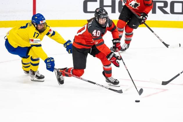 230413 Sofie Lundin of Sweden and Blayre Turnbull of Canada during the 2023 IIHF Womens World Championship quarterfinal game between Canada and Sweden on April 13, 2023 in Brampton Photo Mathilda Ahlberg BILDBYRAN code MA MA0459 ishockey ice hockey world championship women 2023 iihf womens world championship women world championship ice hockey world cup canada sweden women canada sweden bbeng,  Copyright: MATHILDAxAHLBERG BB230413MA070