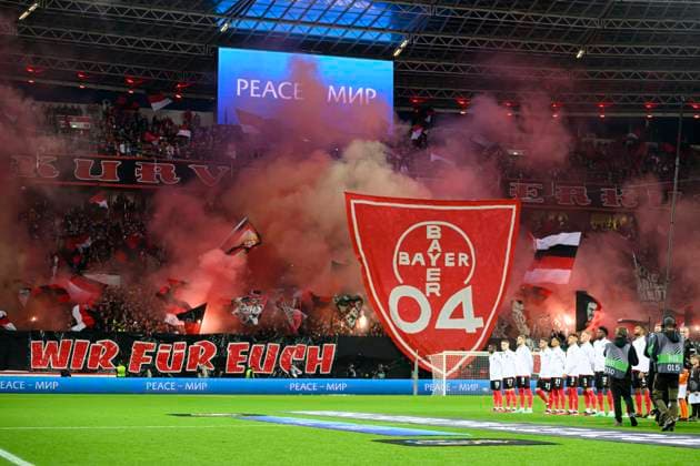 Feature, Team LEV behind a choreography of the fans, We for you Football Europa League, quarterfinal first leg, Bayer 04 Leverkusen LEV Union Saint Gilloise USG , on 13 04 2023 in Leverkusen Germany UEFA regulations prohibit any use of photographs as image sequences and or quasi video Â