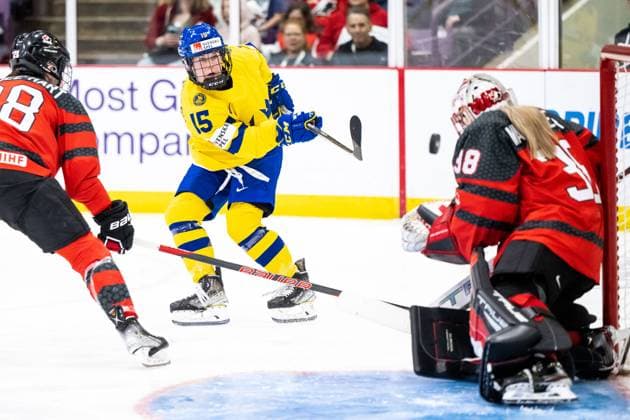 230413 Lisa Johansson of Sweden and goaltender Emerance Maschmeyer of Canada during the 2023 IIHF Women s World Championship quarterfinal game between Canada and Sweden on April 13, 2023 in Brampton Photo Mathilda Ahlberg BILDBYRAN kod MA MA0459 ishockey ice hockey vm dam 2023 iihf womens world championship dam vm ishockey vm kanada sverige women canada sweden bbeng,  Copyright: MATHILDAxAHLBERG BB230413MA102