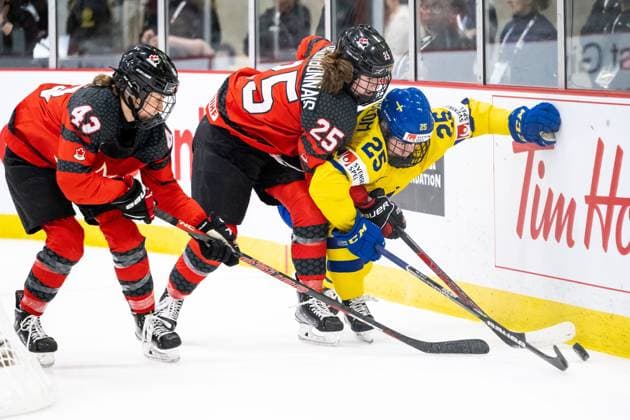 230413 Claire Thompson and Jaime Bourbonnais of Canada and Lina Ljungblom of Sweden during the 2023 IIHF Women s World Championship quarterfinal game between Canada and Sweden on April 13, 2023 in Brampton Photo Mathilda Ahlberg BILDBYRAN code MA MA0459 ishockey ice hockey vm women 2023 iihf womens world championship womens world championship ice hockey world championship canada sweden women canada sweden bbeng,  Copyright: MATHILDAxAHLBERG BB230413MA104