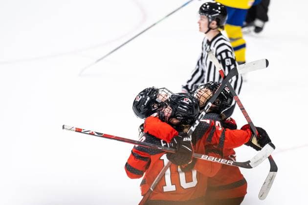 230413 Sarah Fillier, Sarah Nurse and Jocelyne Larocque of Canada celebrate after winning on overtime in the 2023 IIHF Women s World Championship quarterfinal game between Canada and Sweden on April 13, 2023 in Brampton Photo Mathilda Ahlberg BILDBYRAN kod MA MA0459 ishockey ice hockey vm dam 2023 iihf womens world championship dam vm ishockey vm kanada sverige women canada sweden bbeng jubel,  Copyright: MATHILDAxAHLBERG BB230413MA122