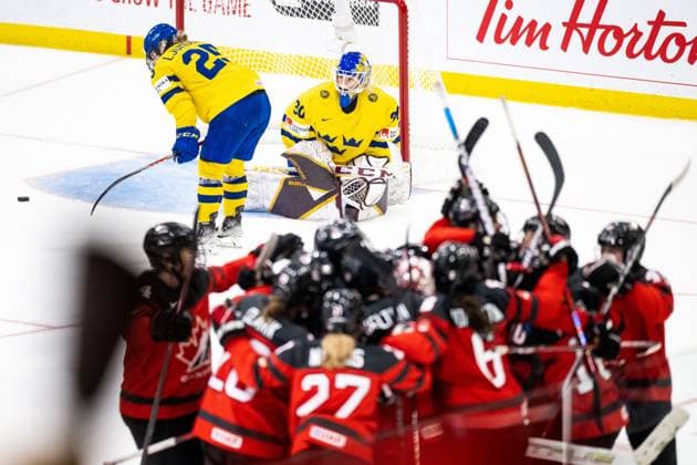 230413 Lina Ljungblom and goaltender Emma Söderberg of Sweden looks dejected and players of Canada after the 2023 IIHF Womens World Championship quarterfinal game between Canada and Sweden on April 13, 2023 in Brampton Photo Mathilda Ahlberg BILDBYRAN code MA MA0459 ishockey ice hockey vm dam 2023 iihf womens world championship womens world championship ice hockey world championship canada sweden women canada sweden bbeng depp jubel,  Copyright: MATHILDAxAHLBERG BB230413MA124