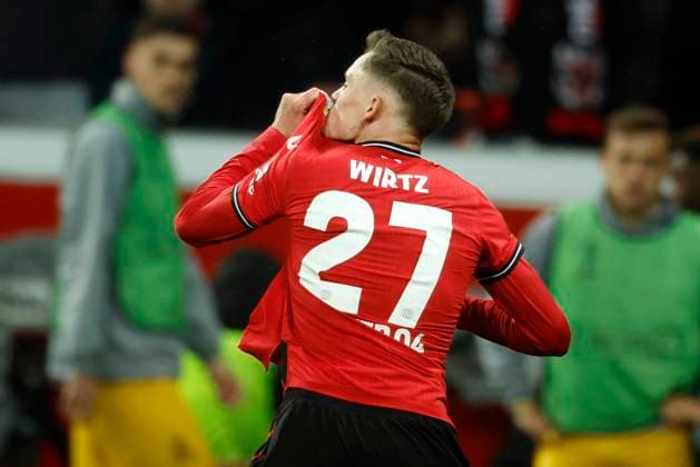 Leverkusen, Germany, UEFA Europa League, Bayer 04 Leverkusen Union Saint Gilloise 1 1 14 04 2023 at Bay Arena in Leverkusen Florian Richard WIRTZ LEV celebrates his goal to 1 1 and kisses the club crest
