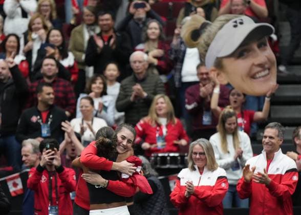 April 15, 2023, VANCOUVER, BC, CANADA: Canada s Leylah Fernandez celebrates with Rebecca Marino, back, after Fernandez and Gabriela Dabrowski defeated Belgium s Kirsten Flipkens and Greet Minnen during a Billie Jean King Cup qualifiers doubles match, in Vancouver, on Saturday, April 15, 2023. Canada won three of the five matches to win the qualifying tie and advance to the 2023 Billie Jean King Cup finals. Canada News - April 15, 2023 - ZUMAc35_ 20230415_zaf_c35_205 Copyright: xDarrylxDyckx