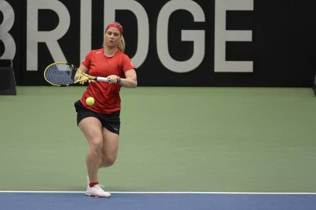 Belgian Ysaline Bovaventure pictured in action during a tennis match against Canadian Fernandez, the third rubber in the meeting between Canada and Belgium, in the qualifiers for the Billie Jean King Cup tennis in Vancouver, Canada, on Sunday 16 April 2023. ANNE-MARIE SORVIN Anne-MariexSorvin  x64976461x