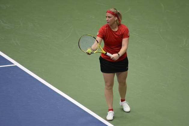 Belgian Ysaline Bovaventure pictured in action during a tennis match against Canadian Fernandez, the third rubber in the meeting between Canada and Belgium, in the qualifiers for the Billie Jean King Cup tennis in Vancouver, Canada, on Sunday 16 April 2023. ANNE-MARIE SORVIN Anne-MariexSorvin  x64976505x