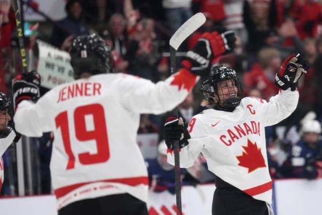April 16, 2023, Brampton, ON, CANADA: Canada forward Marie-Philip Poulin (29) celebrates her goal against the USA with teammate forward Brianne Jenner (19) during first period IHF Women s World Hockey Championship hockey action in Brampton, Ont., on Sunday, April 16, 2023. Canada News - April 16, 2023  - ZUMAc35_ 20230416_zaf_c35_077 Copyright: xNathanxDenettex