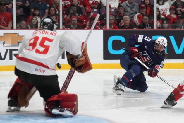 April 16, 2023, Brampton, ON, CANADA: USA forward Hannah Bilka (23) looks on as Canada goaltender Ann-Renee Desbiens makes a save during second period IHF Women s World Hockey Championship gold metal hockey action in Brampton, Ont., on Sunday, April 16, 2023. Canada News - April 16, 2023  - ZUMAc35_ 20230416_zaf_c35_088 Copyright: xNathanxDenettex
