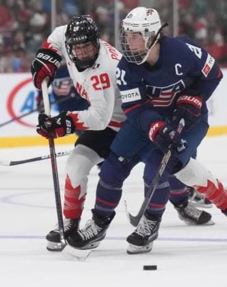 April 16, 2023, Brampton, ON, CANADA: USA forward Hilary Knight (21) and Canada forward Marie-Philip Poulin (29) battle during second period IHF Women s World Hockey Championship gold metal hockey action in Brampton, Ont., on Sunday, April 16, 2023. Canada News - April 16, 2023  - ZUMAc35_ 20230416_zaf_c35_098 Copyright: xNathanxDenettex