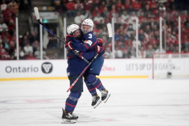April 16, 2023, Brampton, ON, CANADA: USA defender Caroline Harvey (4) celebrates her goal and the team s third goal with teammate Cayla Barnes (3) during third period IHF Women s World Hockey Championship gold medal hockey action against Canada in Brampton, Ont., on Sunday, April 16, 2023. Canada News - April 16, 2023  - ZUMAc35_ 20230416_zaf_c35_103 Copyright: xFrankxGunnx