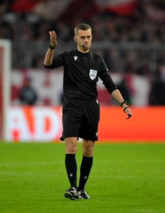 19 04 2023, Football UEFA Champions League 2022 2023 quarterfinals, FC Bayern Munich Manchester City, at Allianz Arena Munich referee Clement Turpin FRA gestures,