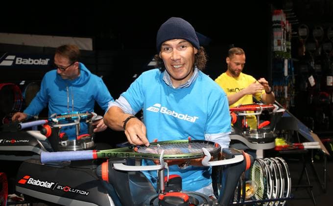 19 04 2023, Germany, Stuttgart, Porsche Tennis Grand Prix 2023, in front Frank Messerer strings the rackets of the pros, in the back from l Markus Hoser and Andy Dehn
