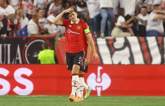 Mandatory Credit: Photo by Kieran McManus Shutterstock (13873490ab) Harry Maguire of Manchester United, ManU shows a look of dejection after Yousseff En-Nesyri of Sevilla scores a goal to make the score 1-0 Sevilla v Manchester United, UEFA Europa League, Quarter-Final, Second Leg, Football, Ramon Sanchez-Pizjuan Stadium, Seville, Spain - 20 Apr 2023 Sevilla v Manchester United, UEFA Europa League, Quarter-Final, Second Leg, Football, Ramon Sanchez-Pizjuan Stadium, Seville, Spain - 20 Apr 2023 Copyright: xKieranxMcManus Shutterstockx 13873490ab