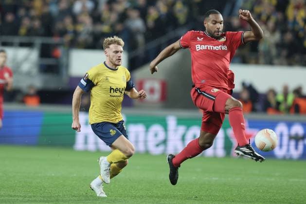 Union s Yorbe Vertessen and Leverkusen s Jonathan Tah fight for the ball during a soccer match between Belgian Royale Union Saint-Gilloise and German Bayer 04 Leverkusen, Thursday 20 April 2023 in Anderlecht, Brussels, the return leg of the quarterfinals of the UEFA Europa League competition. The first leg ended in a 1-1 draw. BRUNOxFAHY  x65498893x