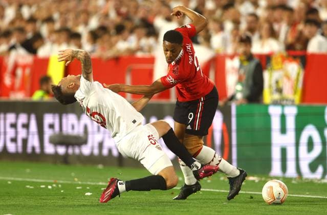Mandatory Credit: Photo by Kieran McManus Shutterstock (13873490ap) Anthony Martial of Manchester United, ManU fouls Lucas Ocampos of Sevilla Sevilla v Manchester United, UEFA Europa League, Quarter-Final, Second Leg, Football, Ramon Sanchez-Pizjuan Stadium, Seville, Spain - 20 Apr 2023 Sevilla v Manchester United, UEFA Europa League, Quarter-Final, Second Leg, Football, Ramon Sanchez-Pizjuan Stadium, Seville, Spain - 20 Apr 2023 Copyright: xKieranxMcManus Shutterstockx 13873490ap